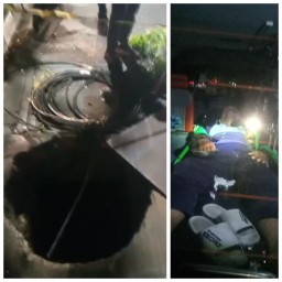 Seorang Pengendara Motor Terjatuh Ke Dalam Lubang Gorong - Gorong Yang Terbuka Di Jalan Kenjeran Kota Surabaya