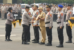 Bupati Pringsewu Terima Penghargaan Kapolda Lampung atas Dukungan Program Akulturasi Budaya