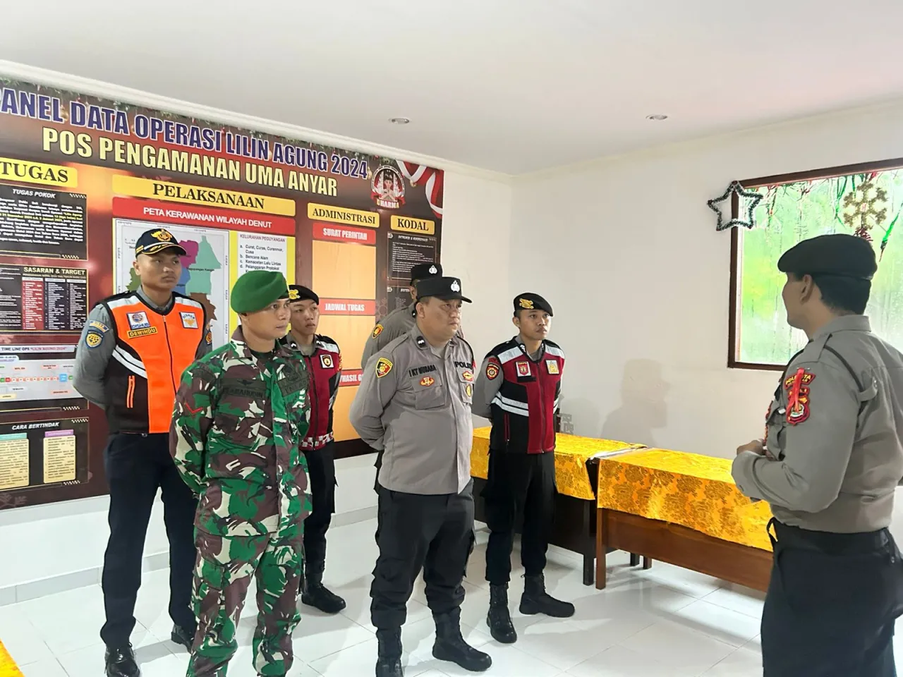Operasi Lilin Agung 2024: Pospam Uma Anyar Tetap Siaga Meski Cuaca Buruk
